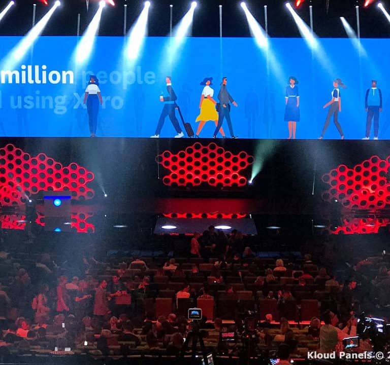 A large screen displays 